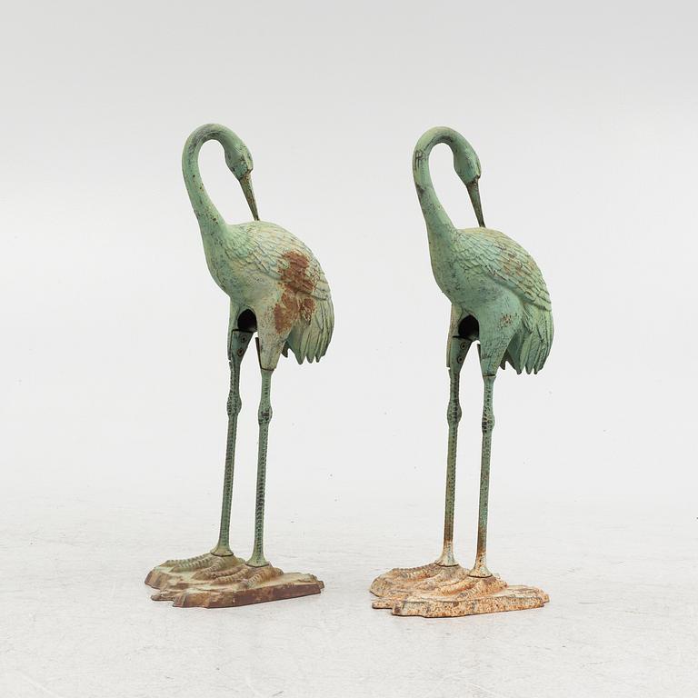 Garden sculptures, a pair, metal, late 20th century.