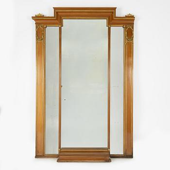 An Empire style mirror, around the year 1900.