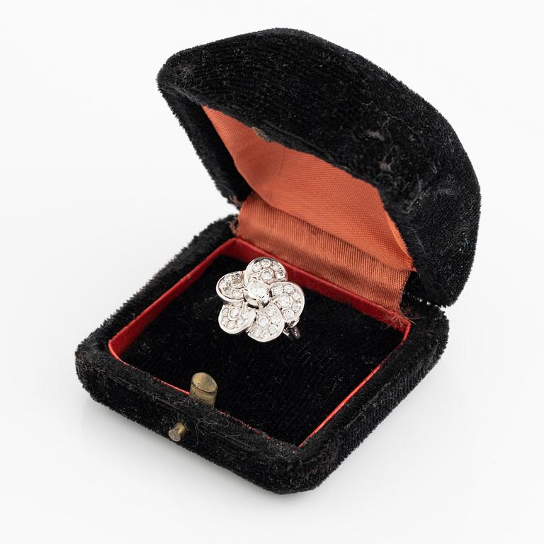 White gold and brilliant cut diamond flower ring.