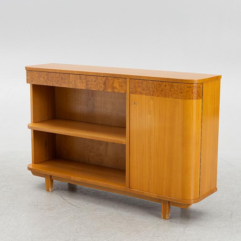 A Swedish Modern bookcase with cabinet, 1940's.