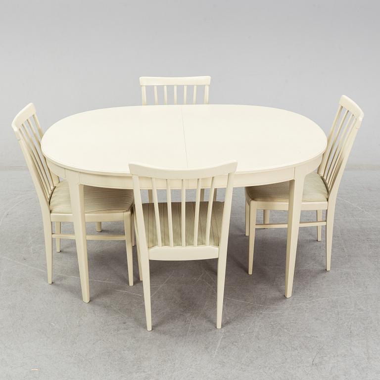 A dining table with six chairs by Carl Malmsten. Second half of the 20th Century.