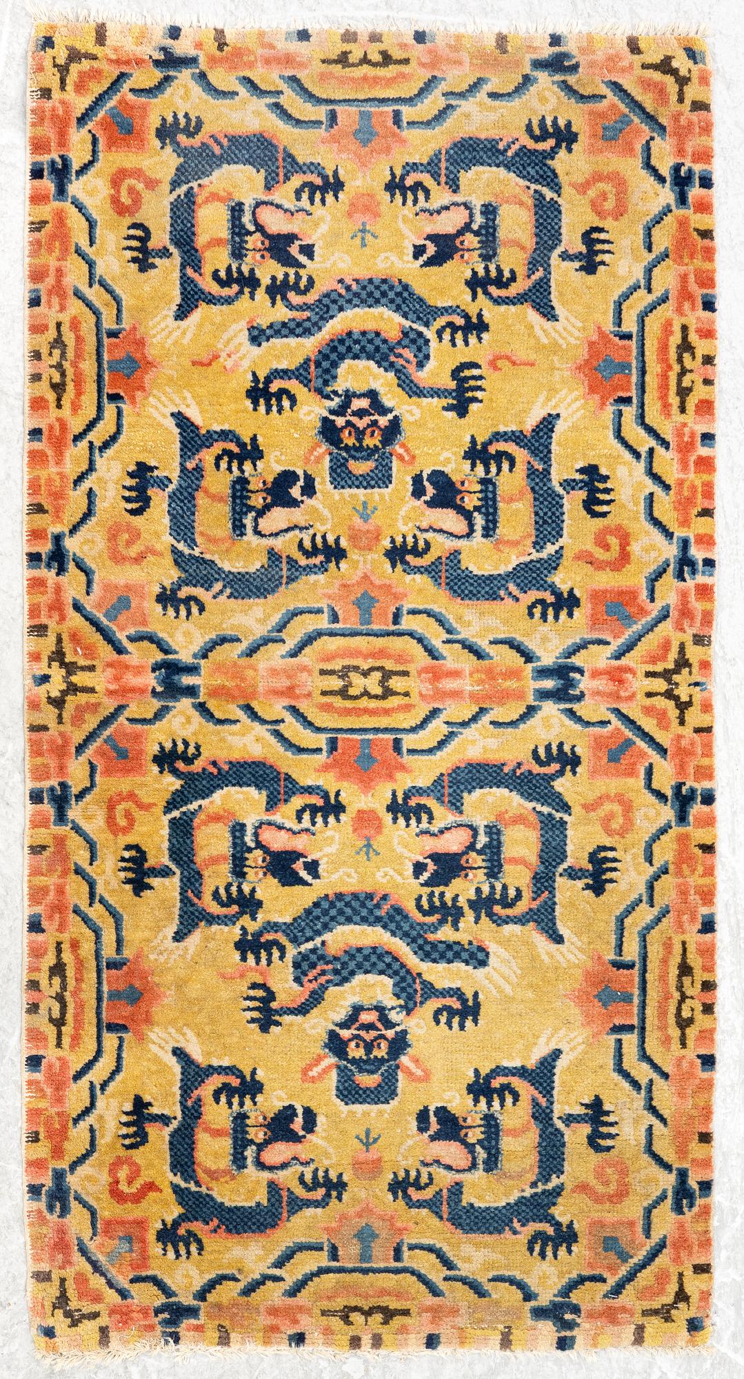A Chinese antique Ningxia rug, late Qing dynasty, c. 128 x 67 cm.