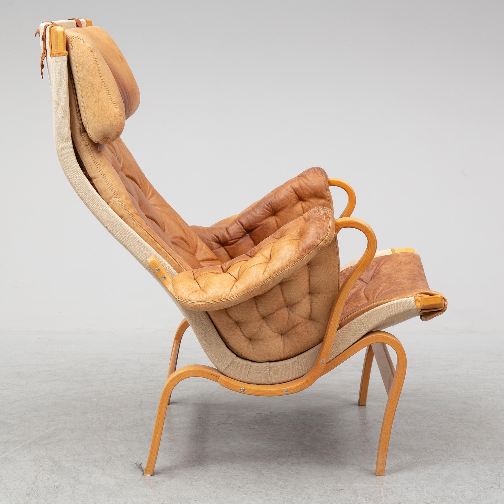 A 'Pernilla' armchair by Bruno Mathsson for dux.