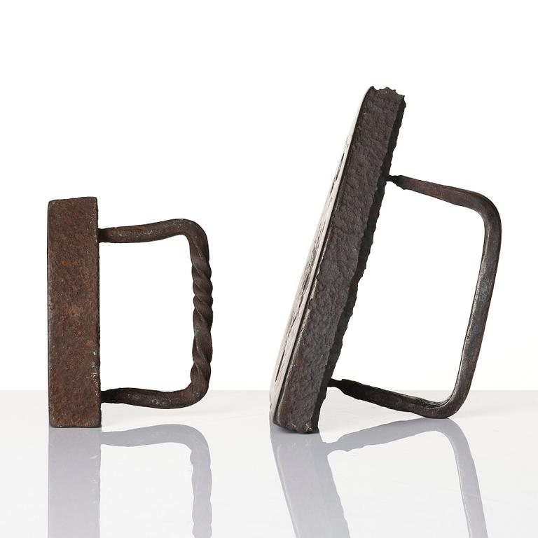 Two cast iron clothes irons, 18th / early 19th century.