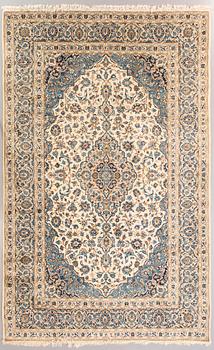An old Nain carpet ca 359x248 cm.