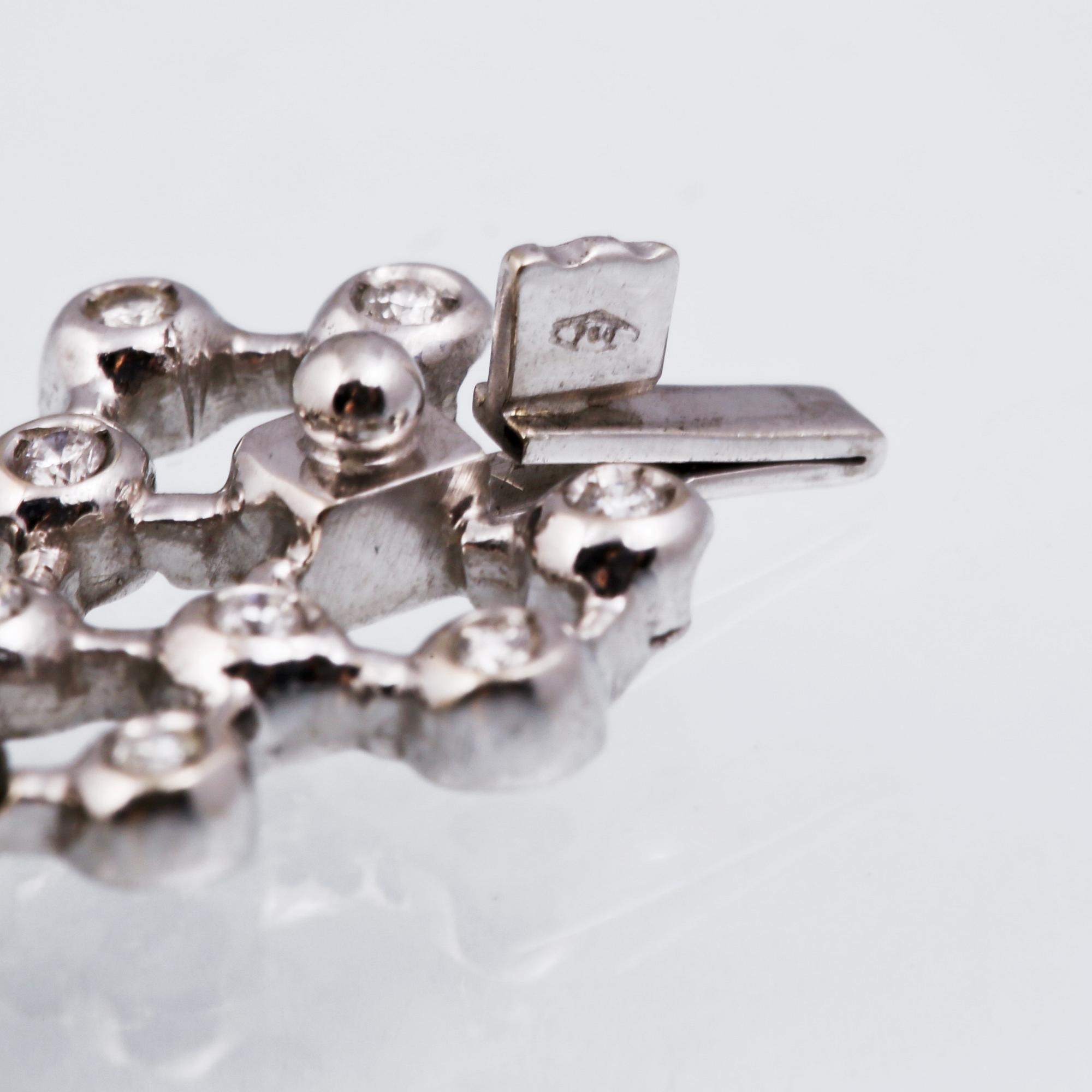 ARMBAND, 18K vitguld med briljantslipade diamanter ca 3.00 ct. Vikt 25,4 gram.