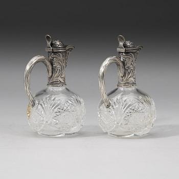 A pair of Russian 20th century parcel-gilt and glass flcongs, possibly of Ivan Katorsky, St. Petersburg 1899-1908.