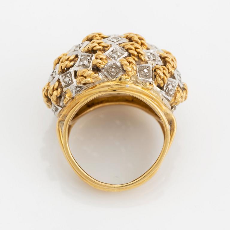 An 18K gold ring set with eight-cut diamonds.