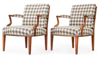 A pair of Josef Frank mahogany armchairs, Svenskt Tenn Sweden.