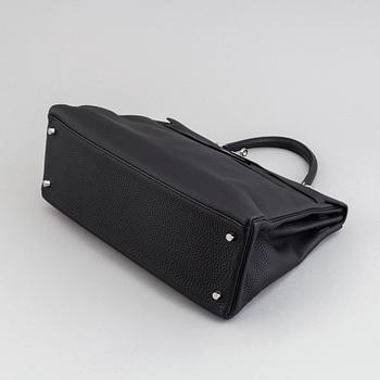 Hermès, a 'Kelly 35' black leather bag, 2017.