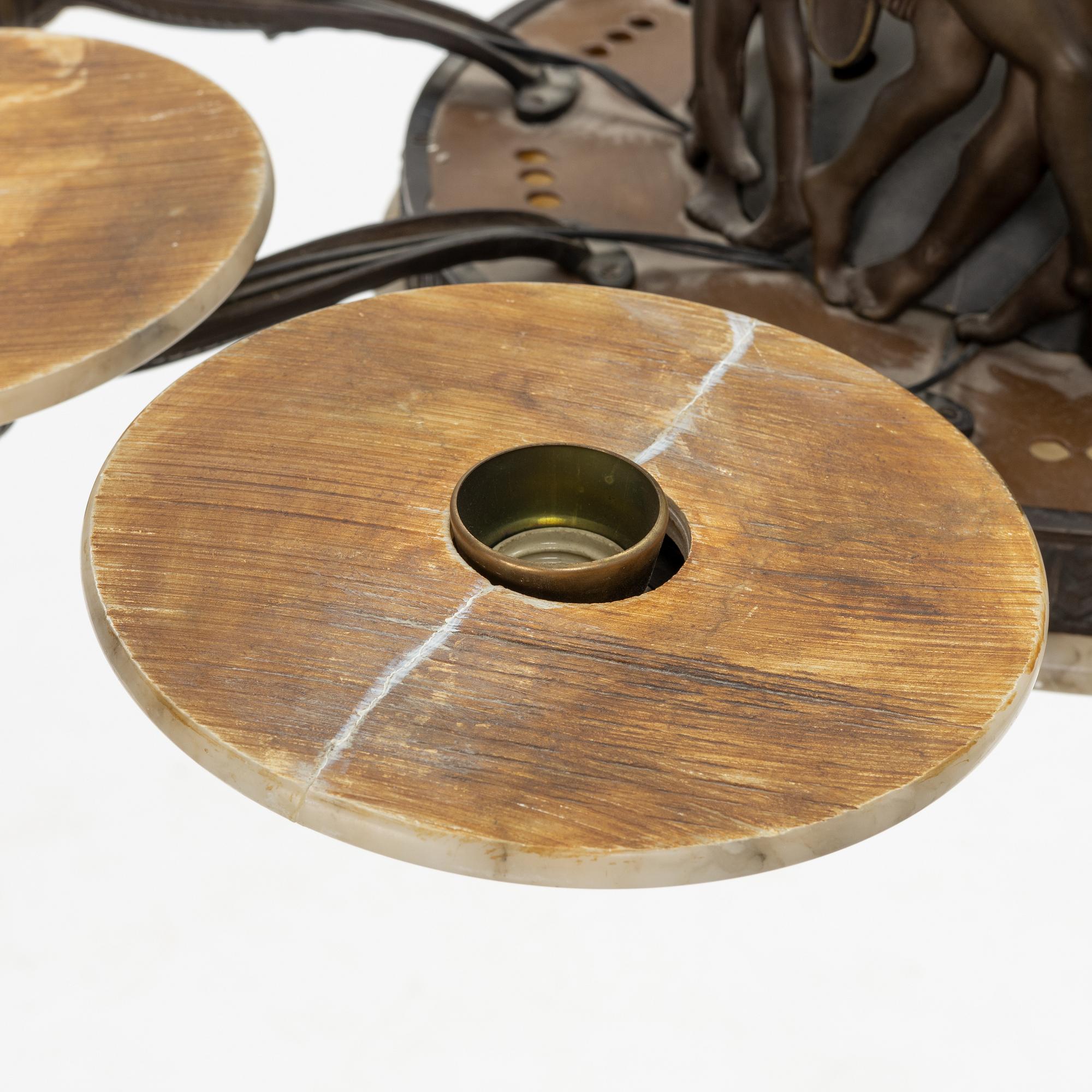 An Art Nouveau Bronze Ceiling Light, early 20th century.