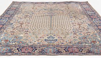 An oriental carpet, circa 350 x 295 cm.