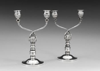 A pair of Johan Rohde sterling candelabra, design nr 343, by Georg Jensen, Copenhagen, 1933-44,