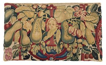 424. A fragment of  a tapestry, c. 57 x 36 cm, attributed to the workshop of Frans Geubels, late 16th century.