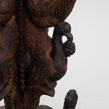 A South East Asian carved wooden piedestal,  20th Century.