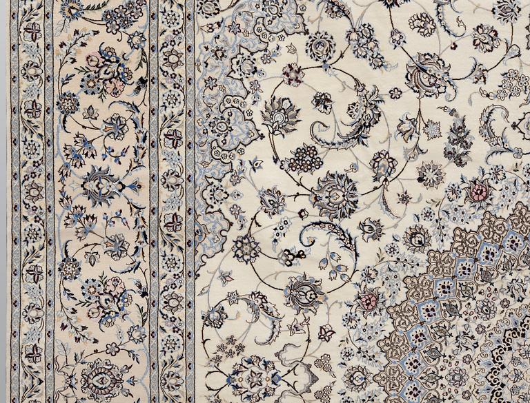 A Nain part silk carpet, 408 x 308 cm.