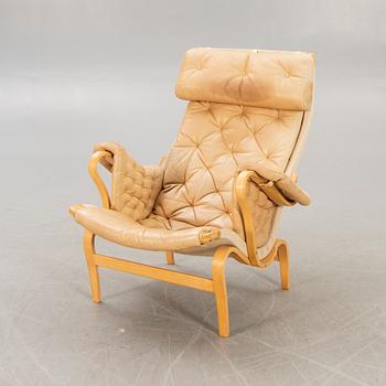 A Bruno Mathsson "Pernilla" leather easy chair for DUX later part of the 20th century.