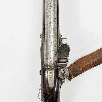 A Swedish flintlock rifle with Brtitish lock.