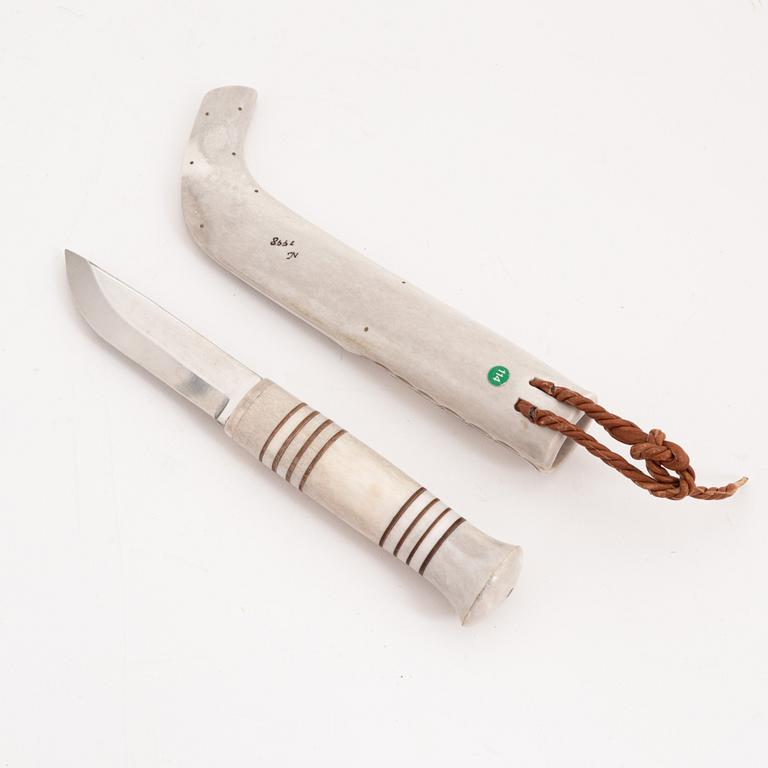 A reindeer horn knife by Gunnar Svonni, signed and dated 1998.