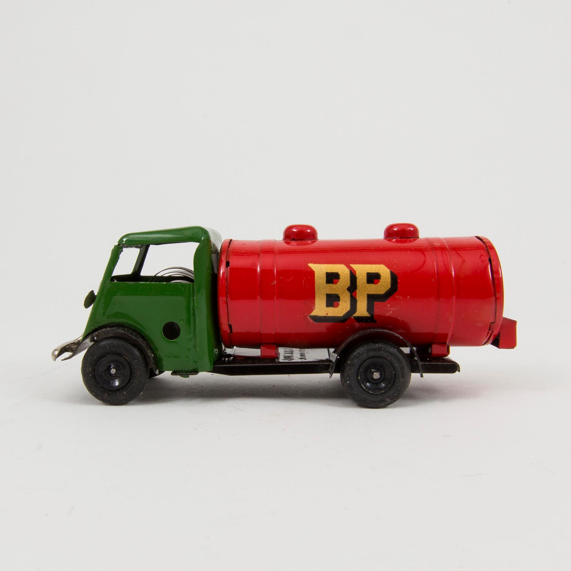 Nine Tri-Ang Minic Toys cars England 1950s.