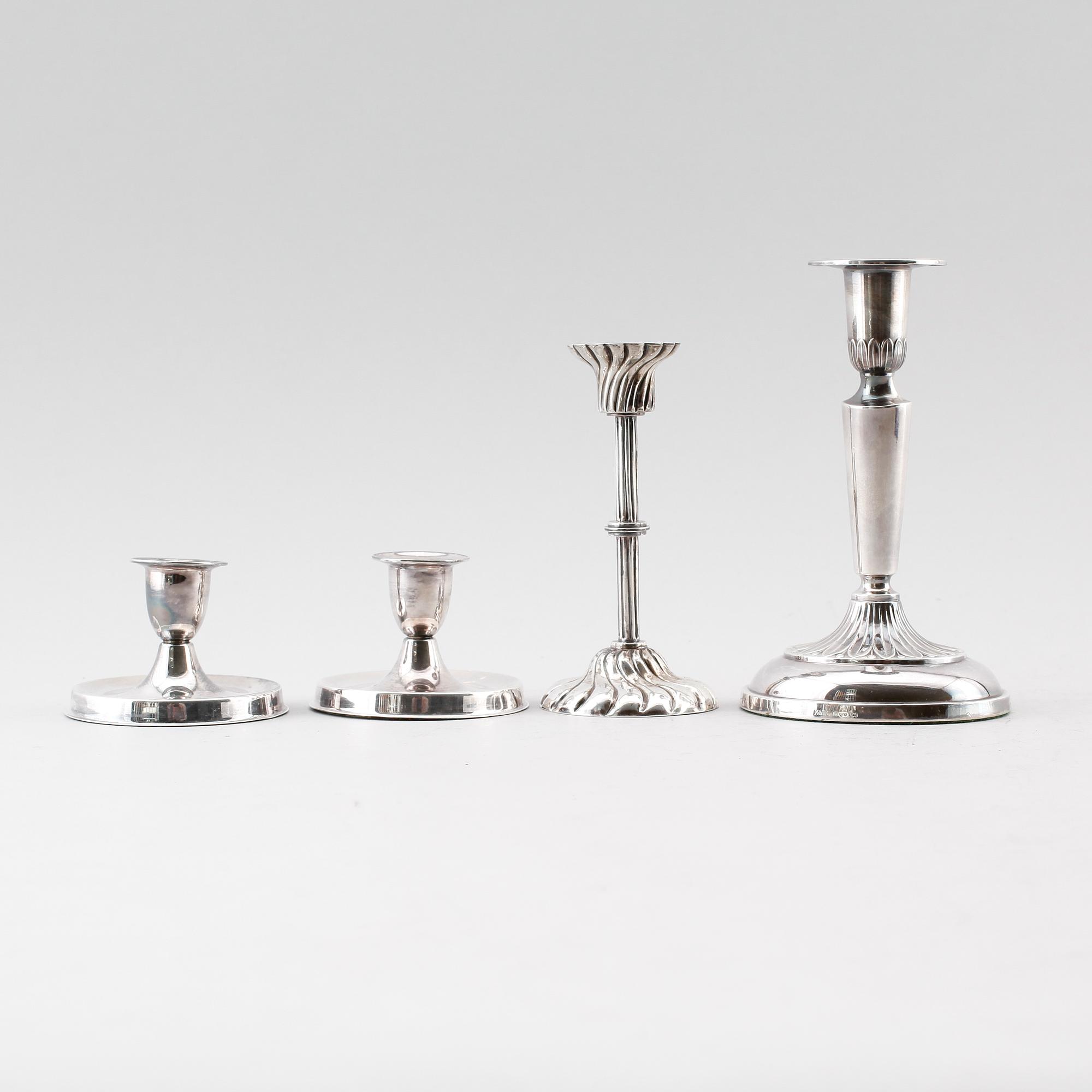 LJUSSTAKAR, 4 st, silver, olika modeller, 1900-tal.