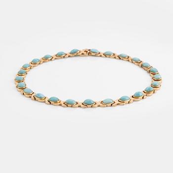 14K gold necklace and ring, with cabochon cut blue stones.