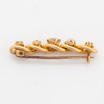 Brosch 18K guld med gammal- och rosenslipade diamanter samt pärlor.