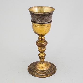 A brass chalice 18th century.