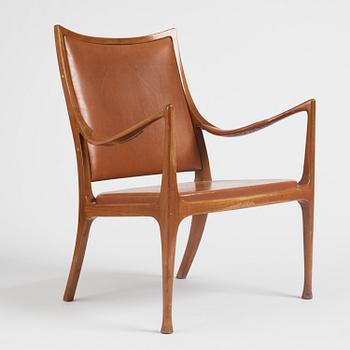 Hans Asplund, a walnut and leather easy chair, Nordiska Kompaniet, ca 1955, for the Nordiska Kompaniet beauty salon.