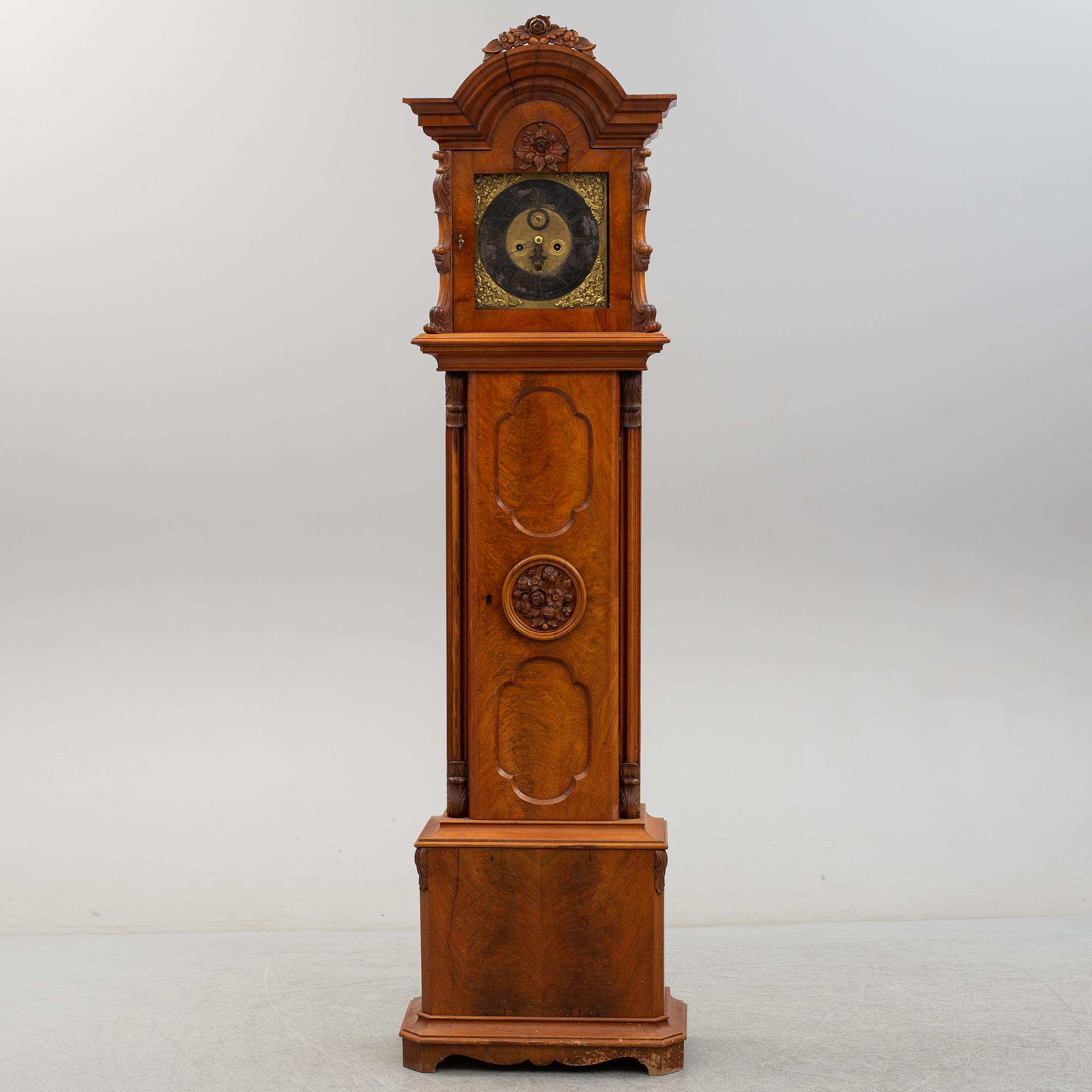 A 18th century long case clock.