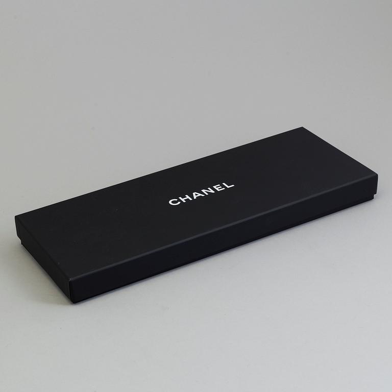 A necklace by Chanel from The Marie Antoinette Coollection 2013, runway piece.