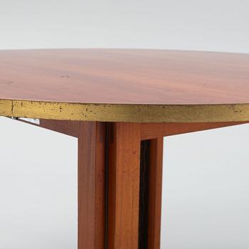 A mid 20th century dining table.