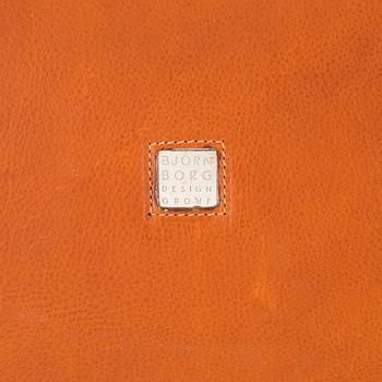 A brown leather and suede Garment cover by Björn Borg designgroup, 1980's.