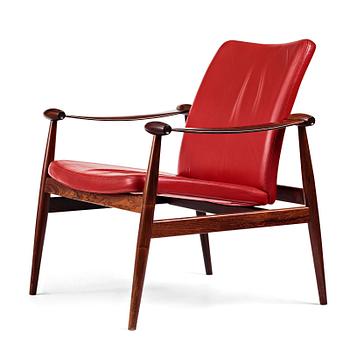 354. Finn Juhl, a model 133 rosewood easy chair from France & Son, Denmark.