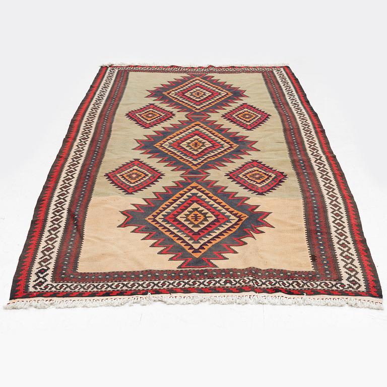 A Kilim carpet, c. 300 x 170 cm.