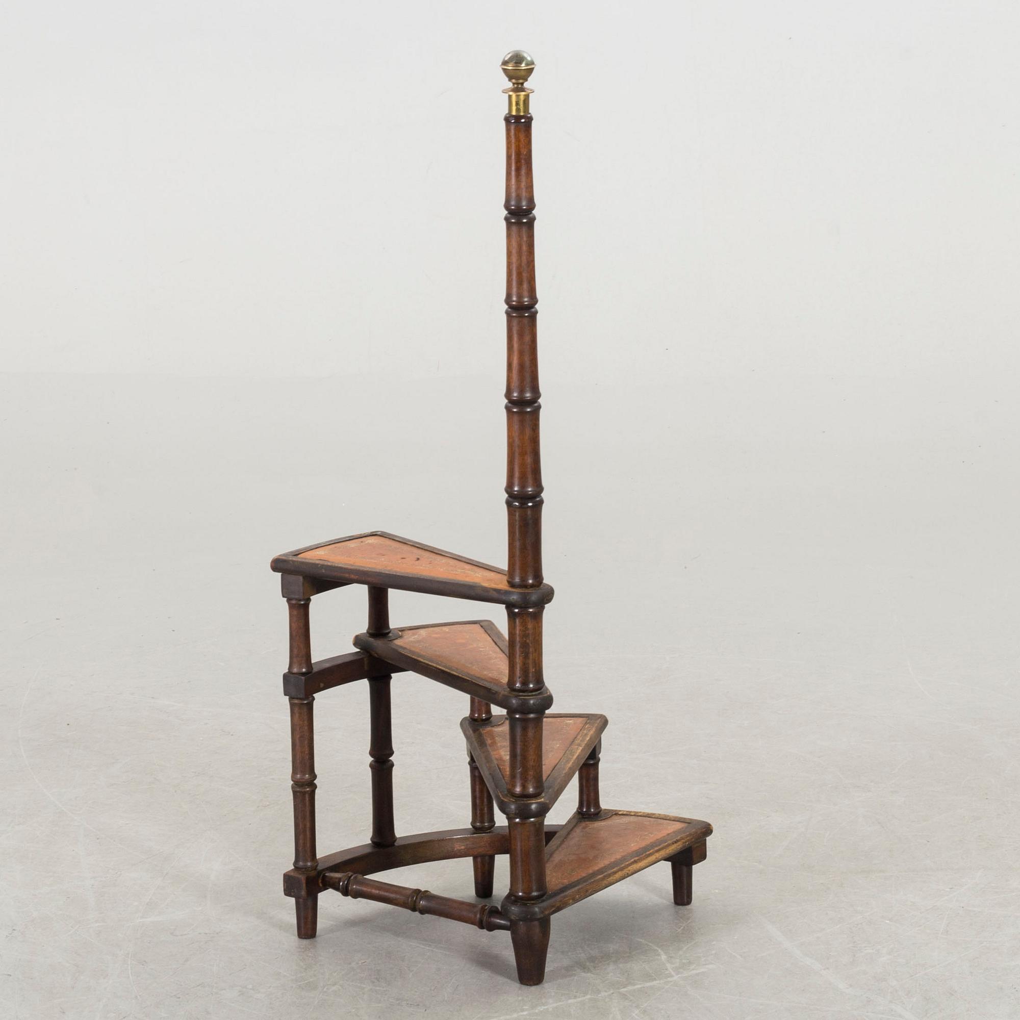 A Mahogany library ladder.