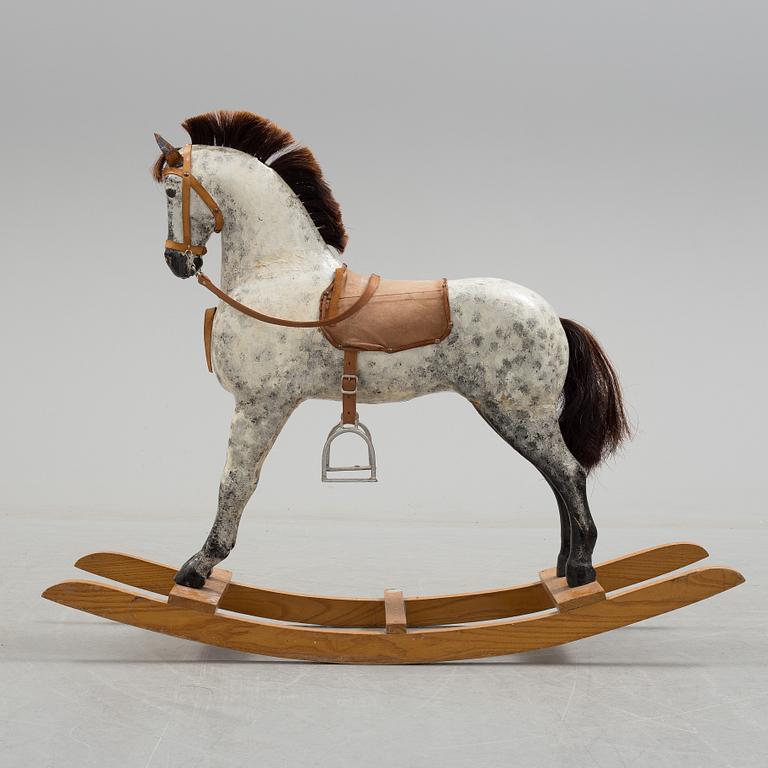 A circa 1900 rocking horse.