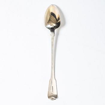 An English silver serving spoon, London 1815.
