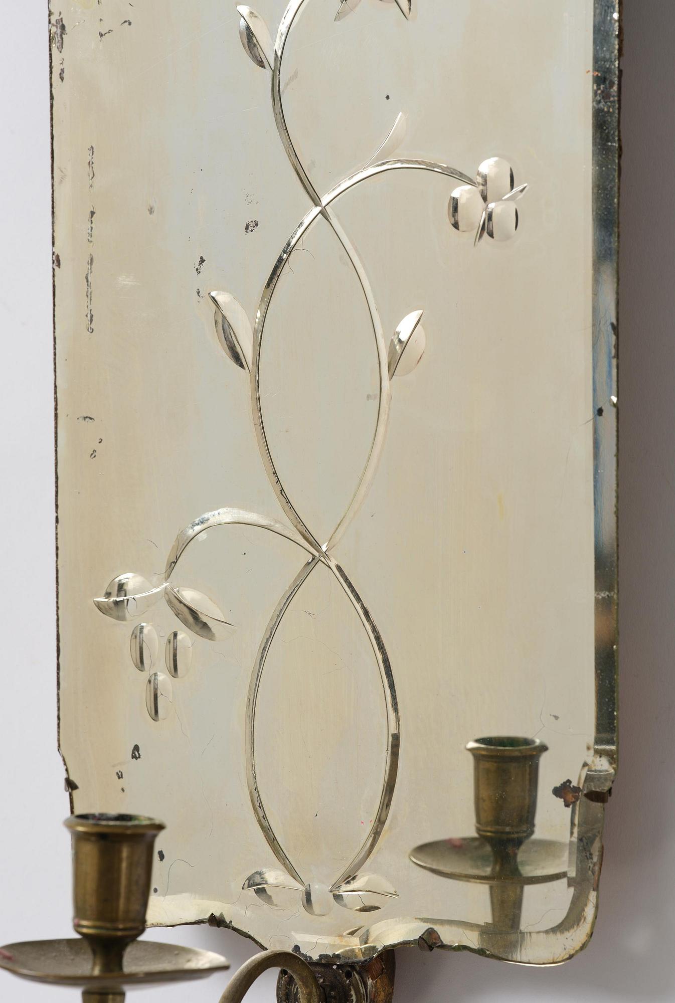 A pair of Swedish engraved-glass one-branch girandole mirrors, later part 18th century.