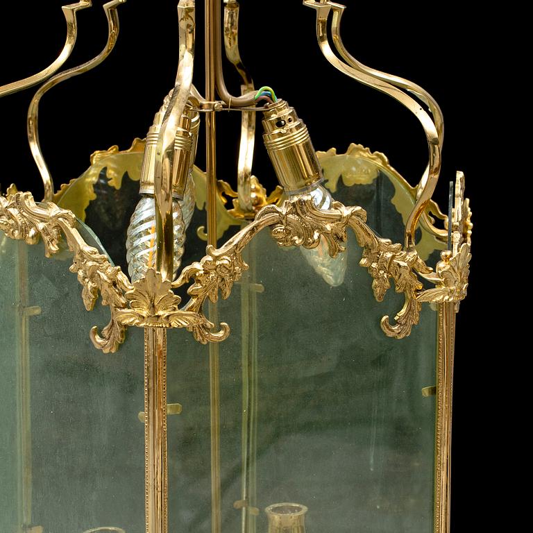 A brass ceiling light "Jubileumslyktan" by K.A. Jonsson, signed and dated 2002.