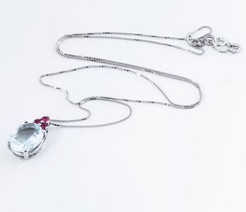 A aquamarine and ruby pendant.