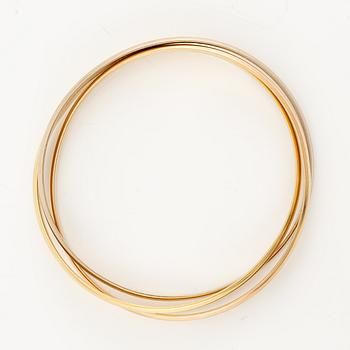 A Cartier bracelet "Trinity" 18K gold in three colours.