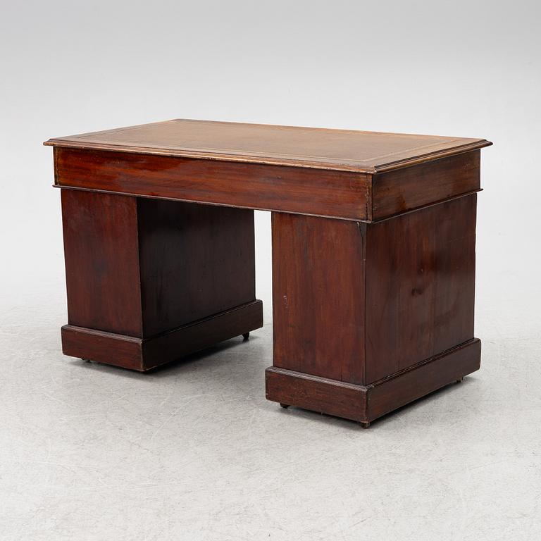 An English style desk, circa 1900.