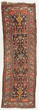 A semiantique/antique Bachtiari runner ca 322 x 106 cm.