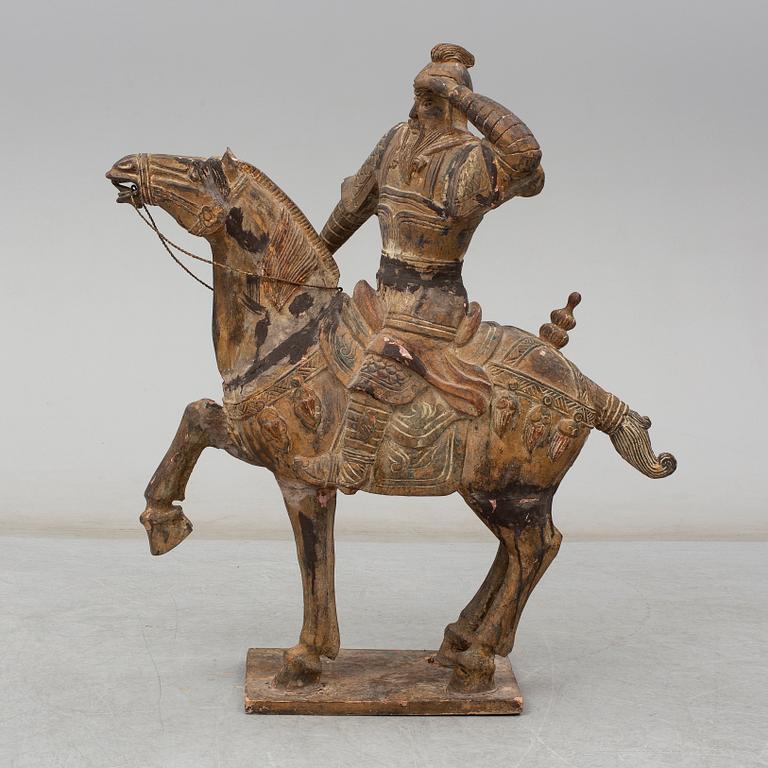 A large modern Chinese wooden sculpture.