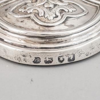 A pair of English 18th century silver candlesticks, marked JB, London 1766.