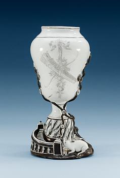 1410. A Marieberg faience vase, dated 1776.