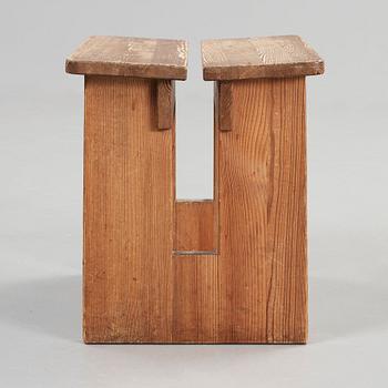 An Axel Einar Hjorth stained pine stool, Nordiska Kompaniet, Sweden 1930's.