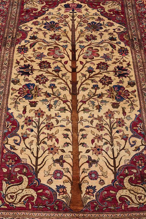 MATTO, a semi-antique silk Kashan,  ca 205 x 131,5 cm.