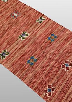 A Kilim runner carpet, 287 x 78 cm.